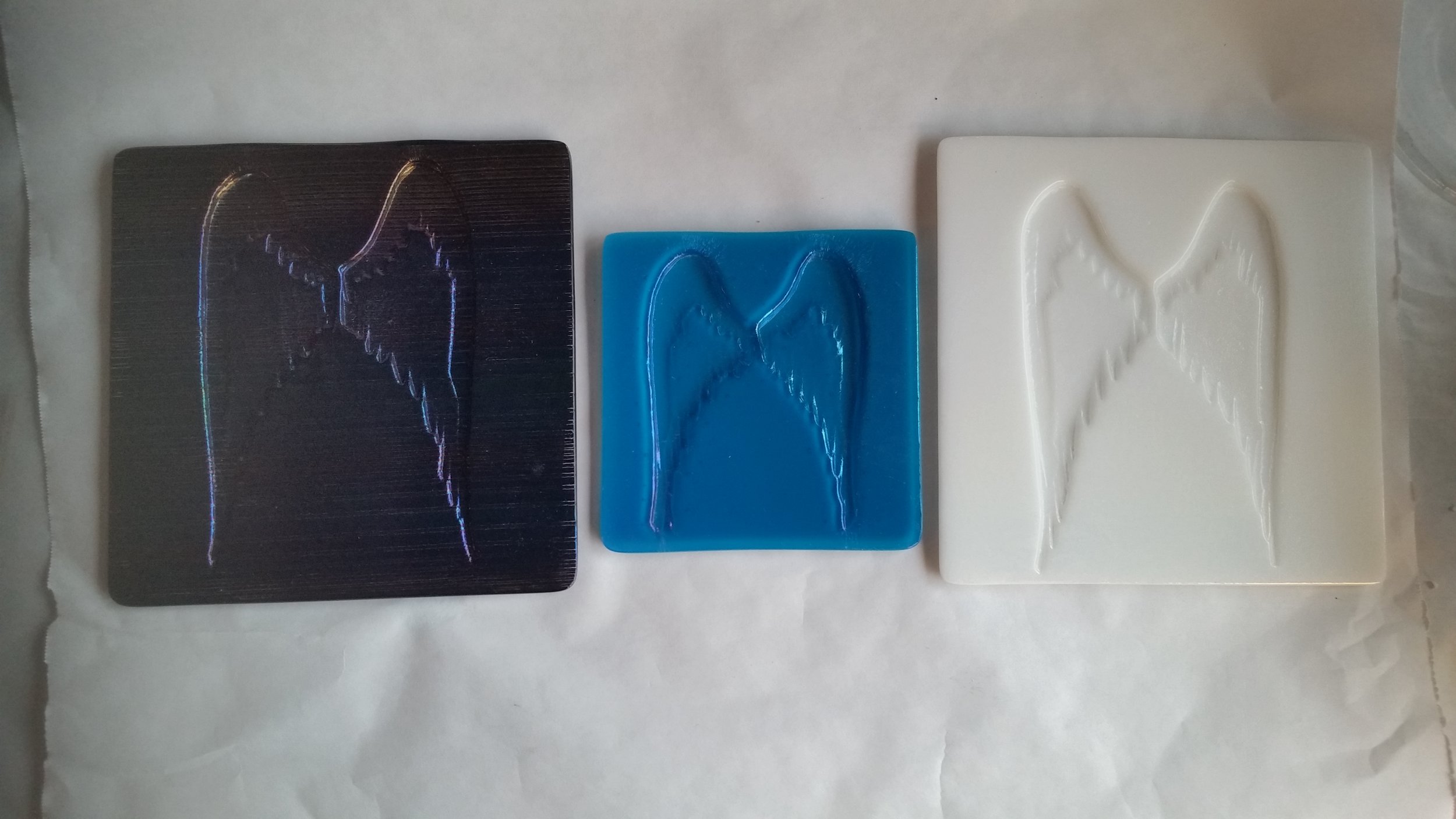 Remembrance for birth celebration. Accordion Black Iridized glass, Baby Blue Iridized glass, White Iridized glass.