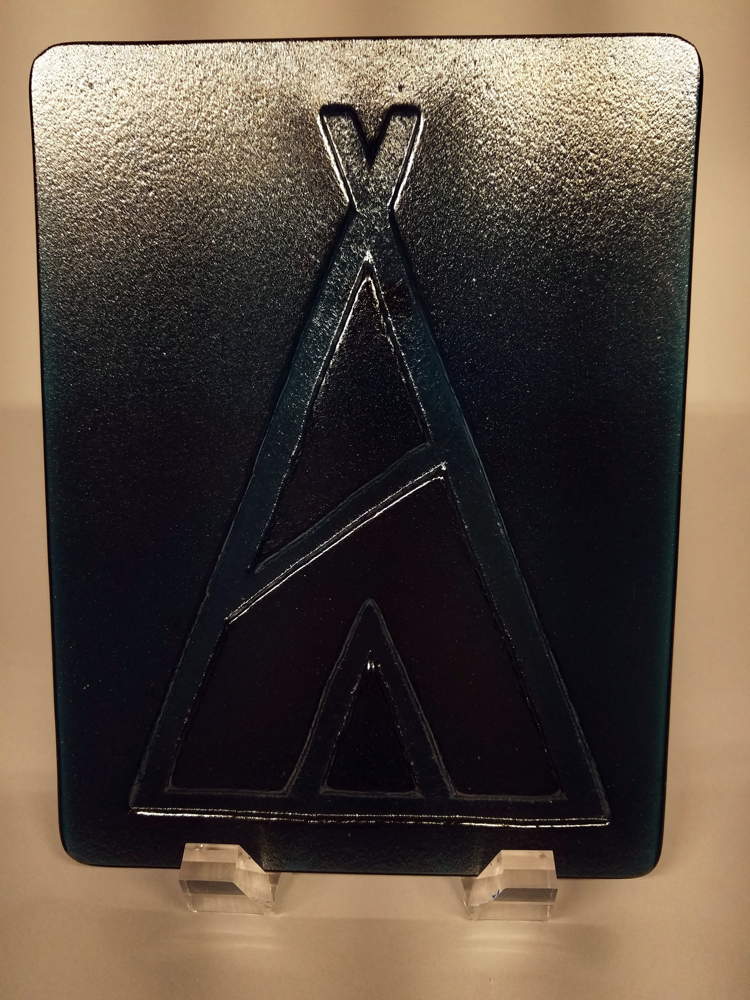 Salon logo for recent opening. Aquamarine glass.