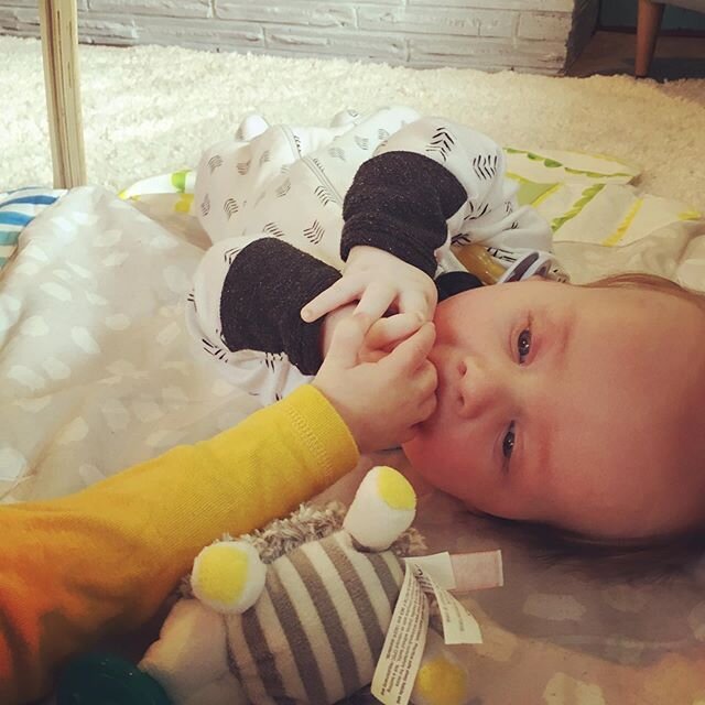 Nom. This baby loves hands! Even if they aren&rsquo;t his. :) #nomnom #handsonlearning #babyboy #friendship