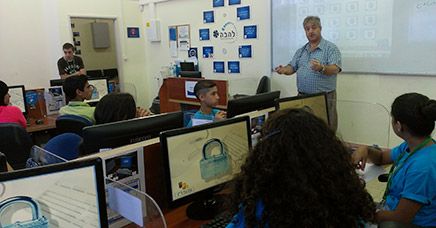 Eran Kolber, international computer software consultant, and his son Travis helped campers create their own newsletters using Microsoft Publisher.