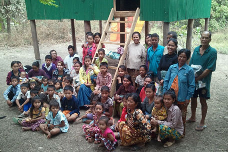 Villagers ready to move in to their new homes.