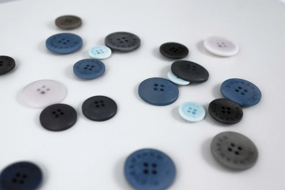 Buttons and hardware for fashion—custom logos, colour cards and Oeko ...