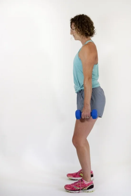 Weighted squat: start position. 
