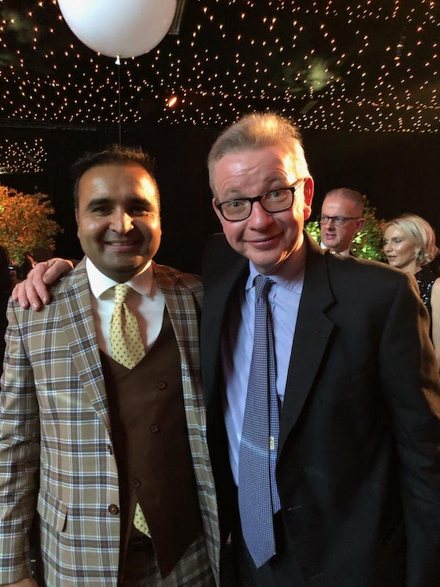 Tejinder Sekhon with UK Secretary of State for Levelling Up, Housing and Communities Michael Gove