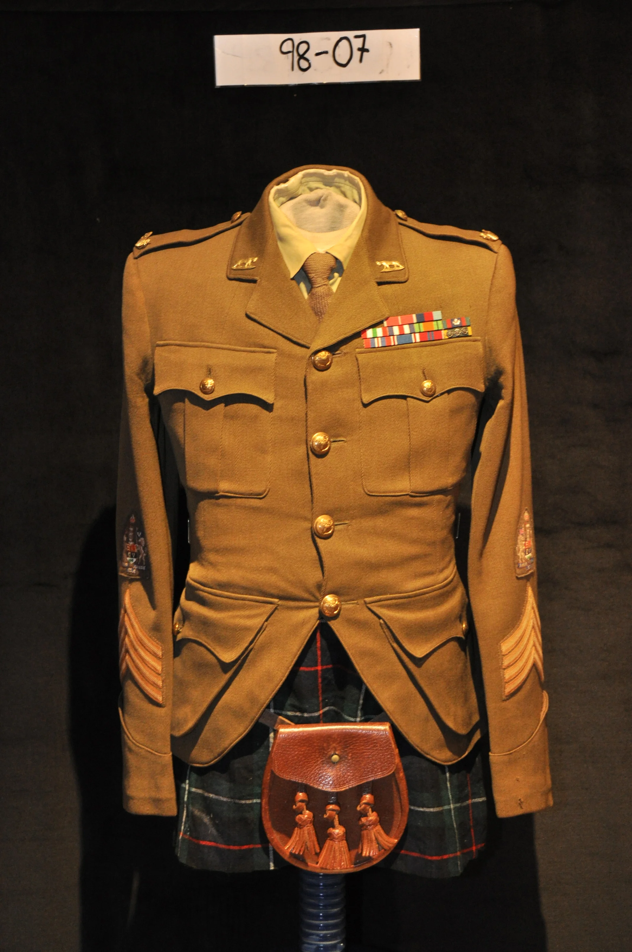 Service Dress Jacket of Pipe-Major (WO1) Ed Esson MBE, Pipe-Major of the 1st Bn 1937-1965.