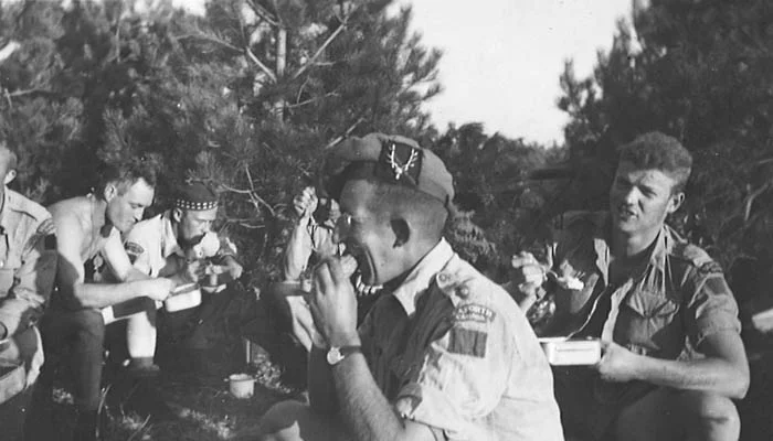 Major H.P. "Budge" Bell-Irving, OC A Company, Sicily (The photo may be taken in England). The person on the right is believed to be Sgt "Ace" Francis, Anti-Tank Platoon. (Info from Col Fairweather, 2013)