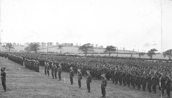 The 1st Cdn Division (including the Seaforths) on parade before their departure to Sicily.