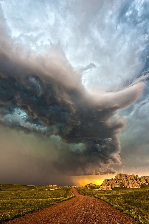 Badlands Spring Storm by Rich Brauhn