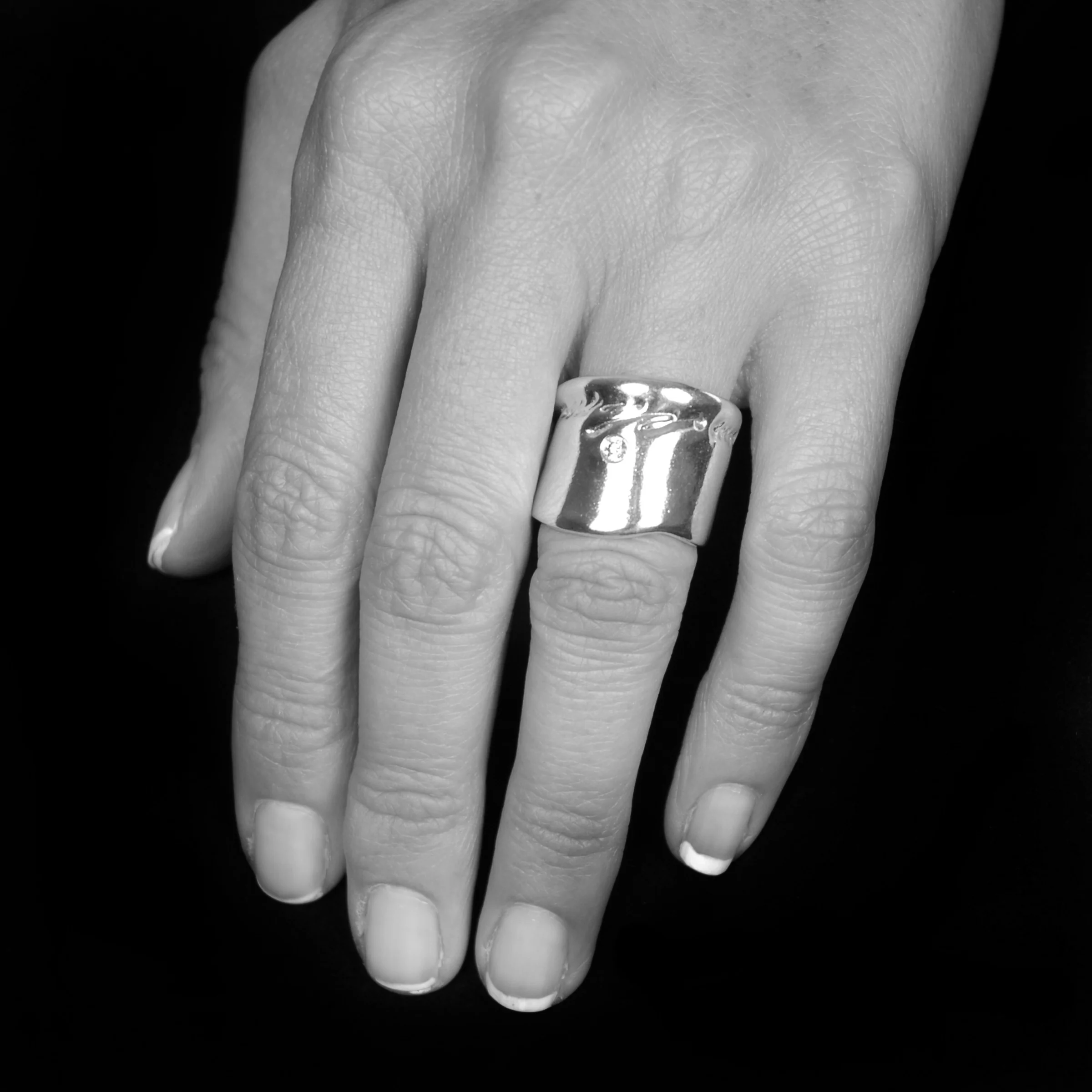 large script ring wearing.jpg