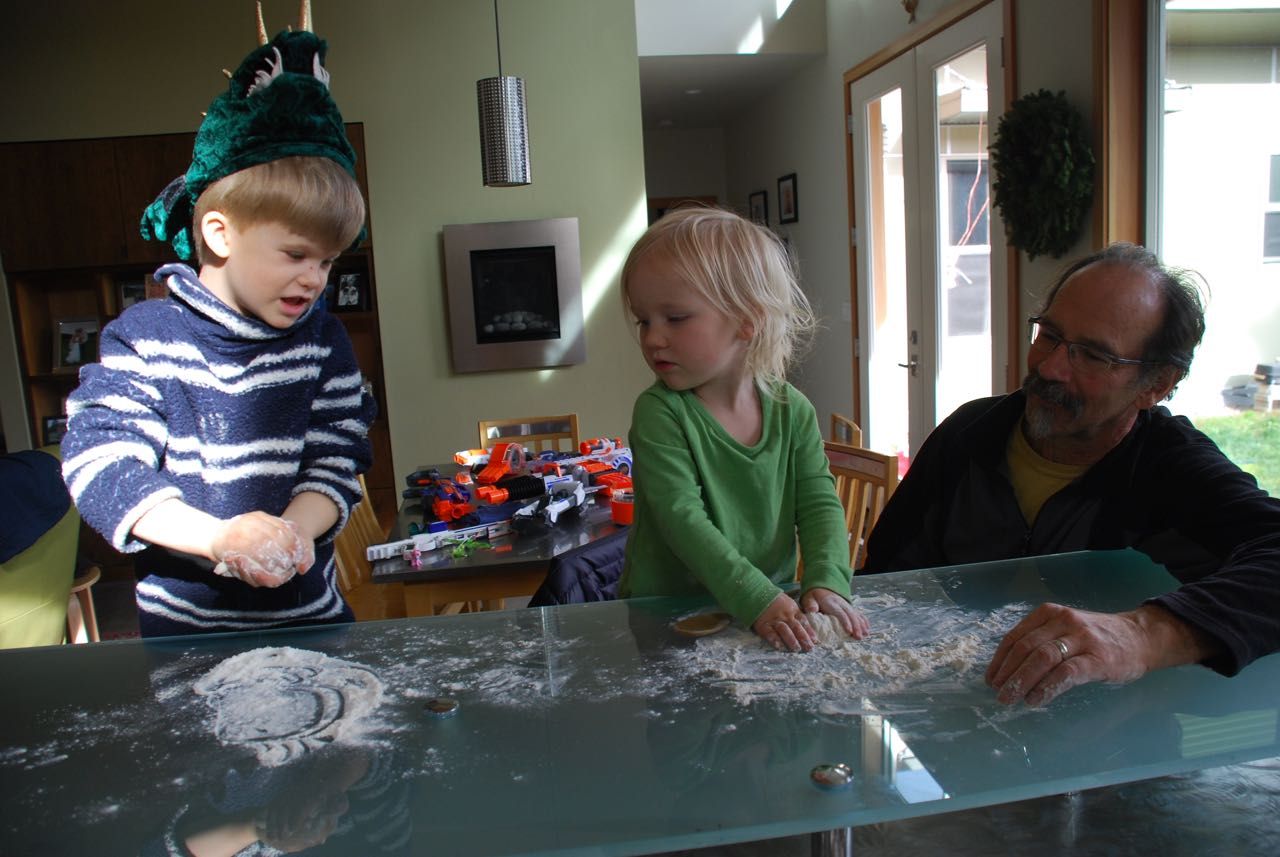 You can see the arsenal of nerf guns behind as the younger cousins help make rolls. 