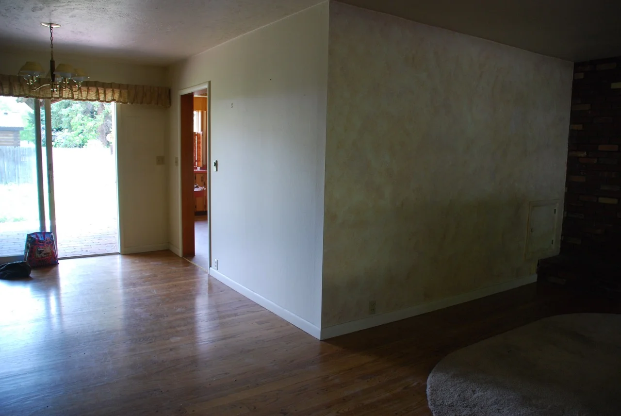 The full walls separating the kitchen from the living & dining room when we bought the house - pre remodel. 