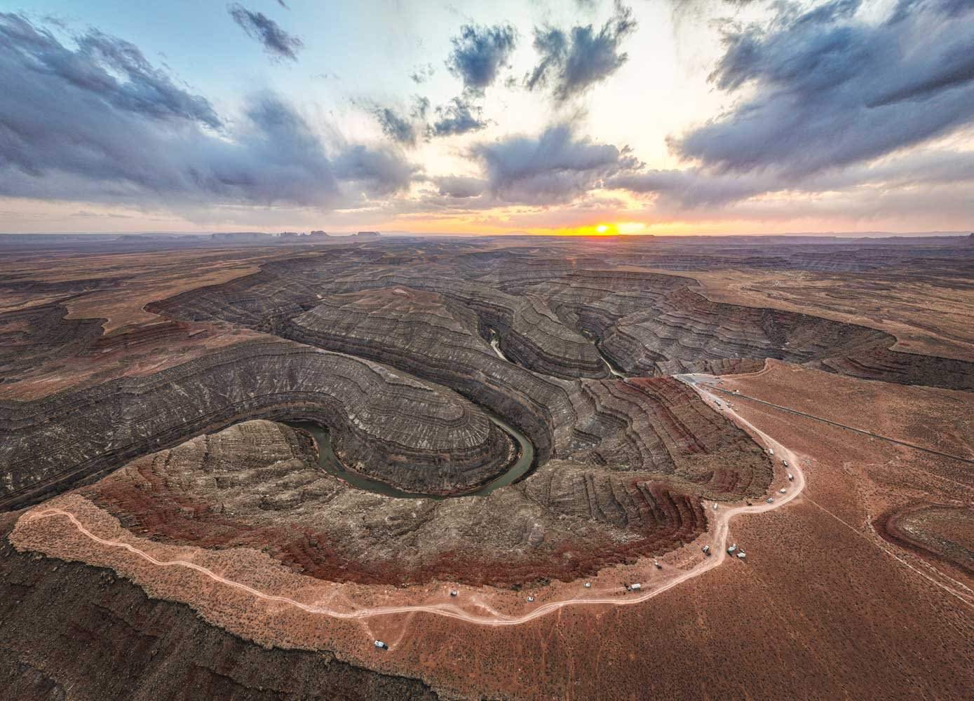 Goosenecks of the San Juan River&mdash;a geological masterpiece carved over 300 million years, winding through the desert like a serpent frozen in time. From this drone&rsquo;s perspective, you can see why they call it &quot;Goosenecks&quot;: the riv
