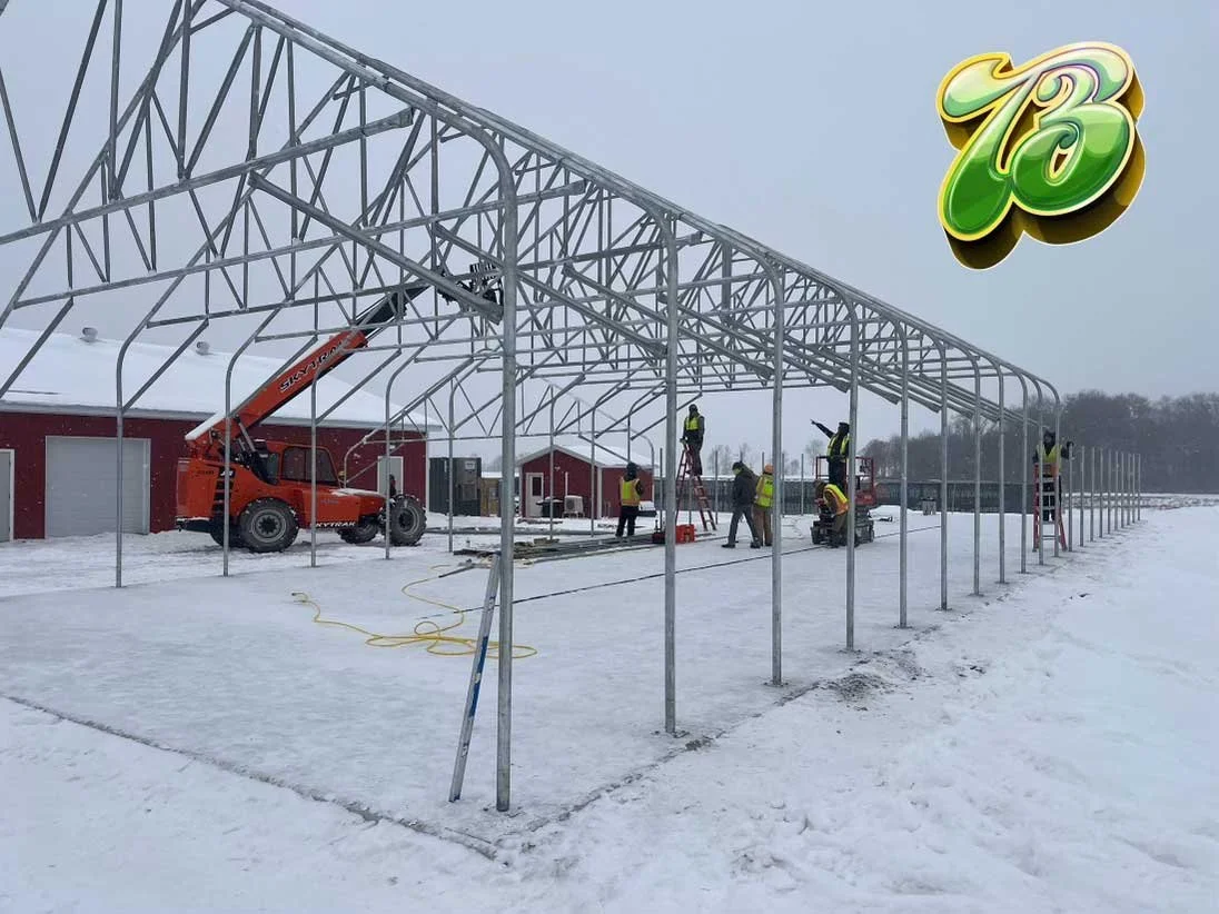 T3-30-x-100-Emerald-Triangle-Greenhouse-under-construction-1.jpg