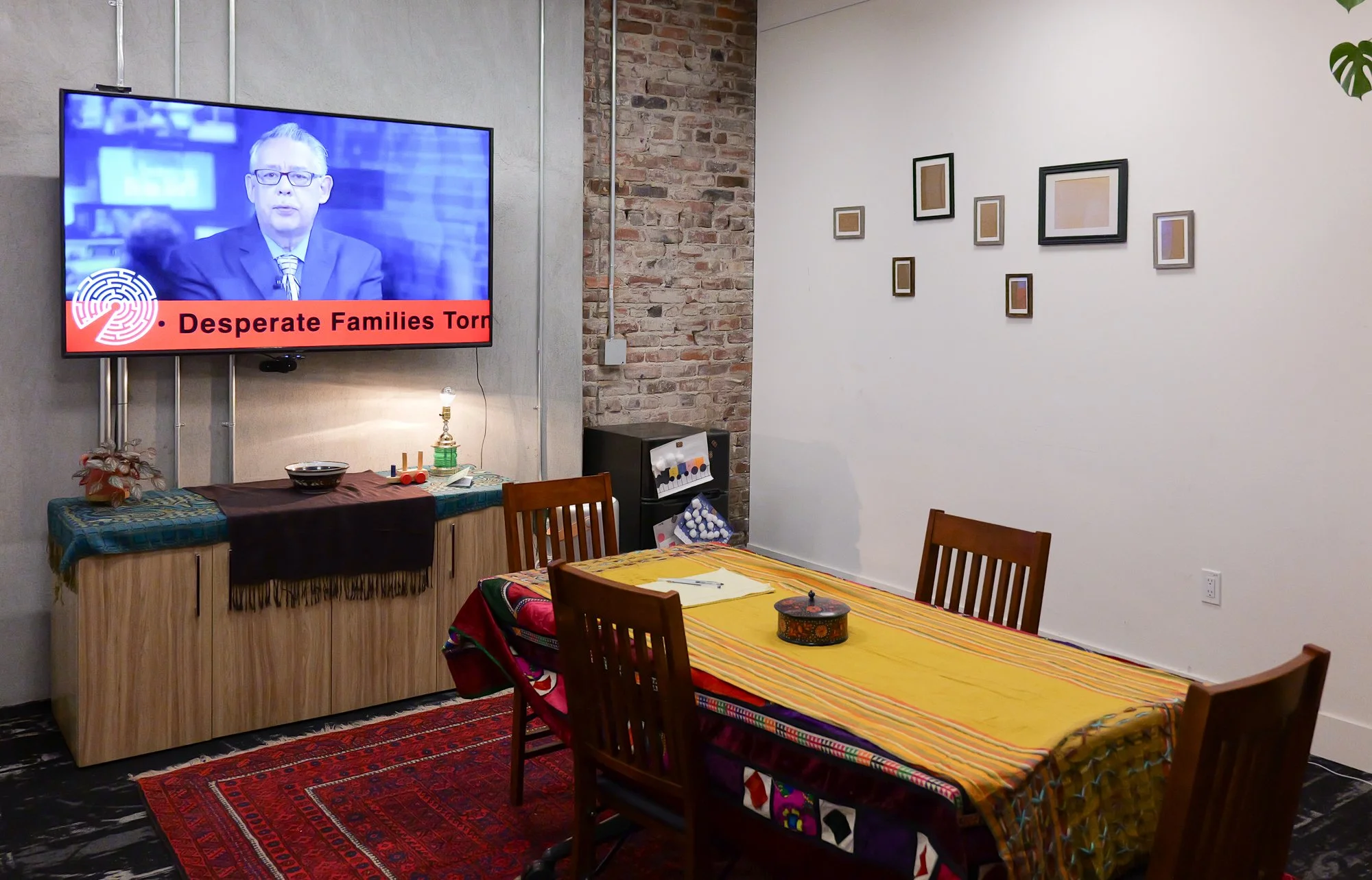  Inside, a looping news reel highlighted the country's turmoil. Players had one hour to secure a way out (visa, plane ticket, etc.) for every family member. 