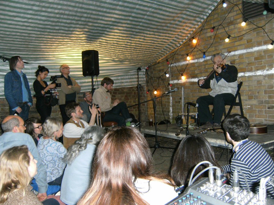 An 84 year old Tom Paley of the New Lost City Ramblers plays at an event in honour of his old schoolfriend Izzy Young founder of the Greenwich Village Folklore Centre