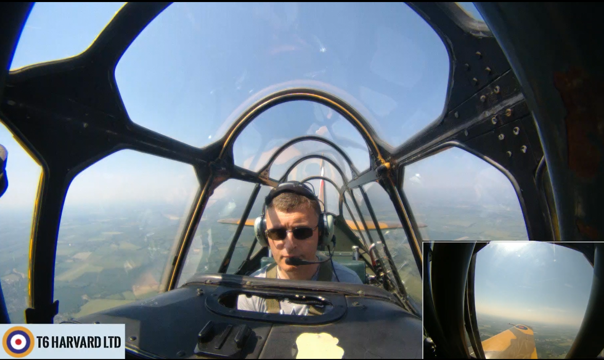 Charles Trumpess flying a T-6 Harvard aircraft