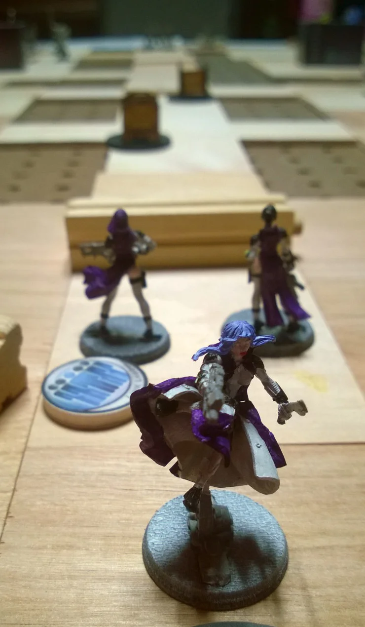 Moiras taunting the Aleph forces to open the doors.