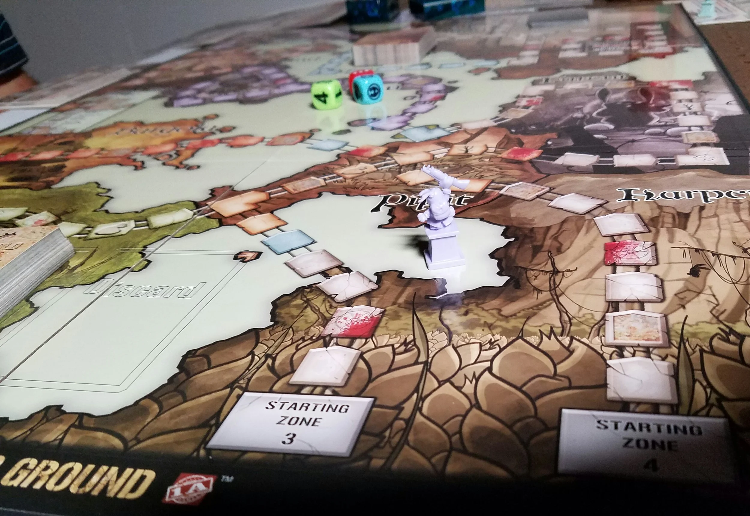 The game board is simple to follow, with the spaces clearly differentiated amongst themselves while still remaining aesthetically pleasing. Setup only takes a minute or two with three decks to shuffle, and some tokens to set out. 