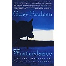Cover of the book 'Winterdance: The Fine Madness of Running the Iditarod' by Gary Paulsen, featuring a silhouette of a dog against a blue background.