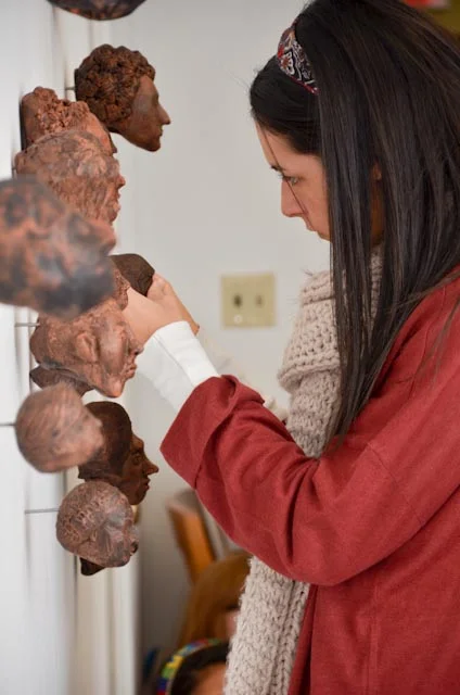 students working on large group ceramic project for figurative sculpture class: The College of Saint Rose, Albany, NY