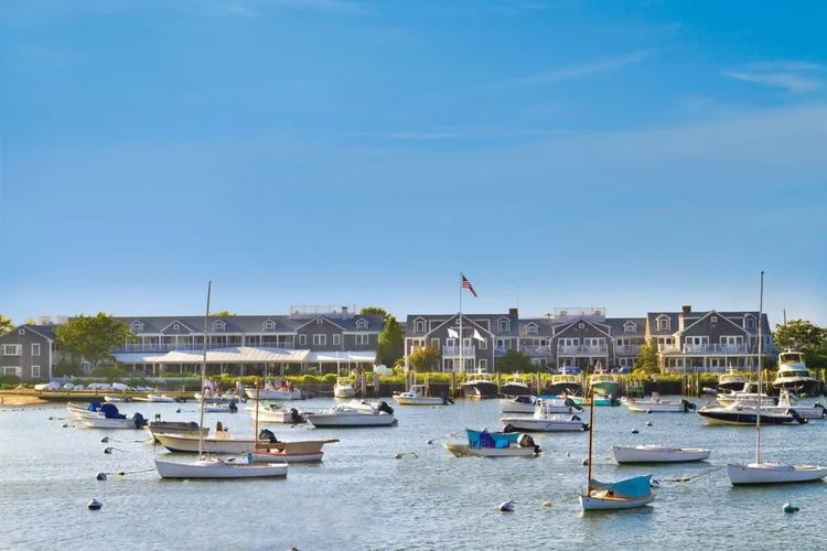 THE GATHERING SPOT : Traditional types wouldn’t dream of celebrating a special occasion anyplace but The White Elephant , Nantucket’s social hub. Weddings on the lawn or terrace come with harbor views; bridal couples can practically watch their guests walk from the ferry. (PHOTO: Courtesy of The White Elephant)