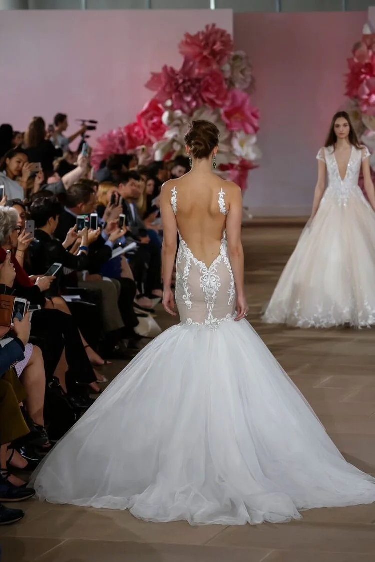 THE DRESS : For the Miami Beach bride intent making a statement, Ines Di Santo ’s sweetheart mermaid gown with a dramatically low illusion back will turn heads coming and going. (PHOTO: Dan Lecca)