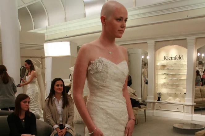 Margo Mallory (right) models a wedding dress. TLC