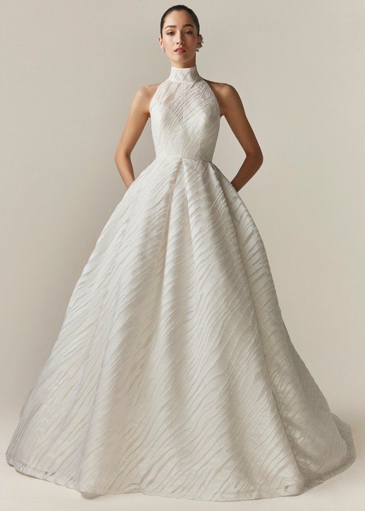 The 2510 dress from @jesuspeiroofficial Lumi&egrave;re collection has large volume in Dolce Vita and scoop halter neckline in Fil Coupe Zebra 

#JesusPeiro #luxurybridal #bridalfashion #weddingdress #bridalstyle #weddinginspiration #weddingtrend #wed