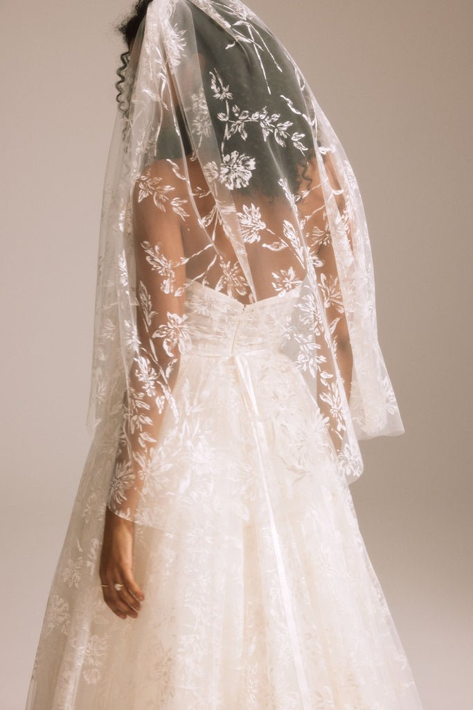 Details you'll remember years after your special day. @amsale's Floral Printed Veil.