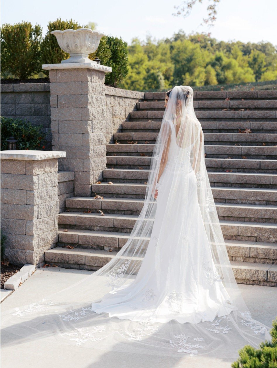 Silver accented floral motifs embellish this classically shaped cathedral length veil by Toni Federici.

#NYLBFW #WeddingInspiration #BridalFashion #WeddingDress #WeddingInspo #BridalInspo #WeddingStyle #RomanticWedding #WeddingPhotography #BridalSty