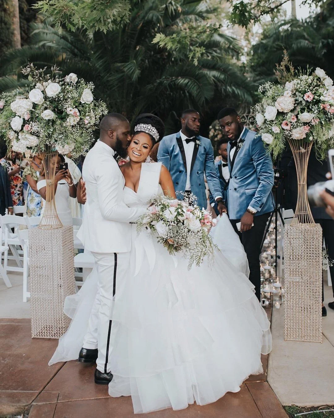 Kissing into forever. This bride radiates in a breathtaking @bridesbynona gown. 

#2026bride #weddinginspo #weddingdress #bridesbynona #nylbfw