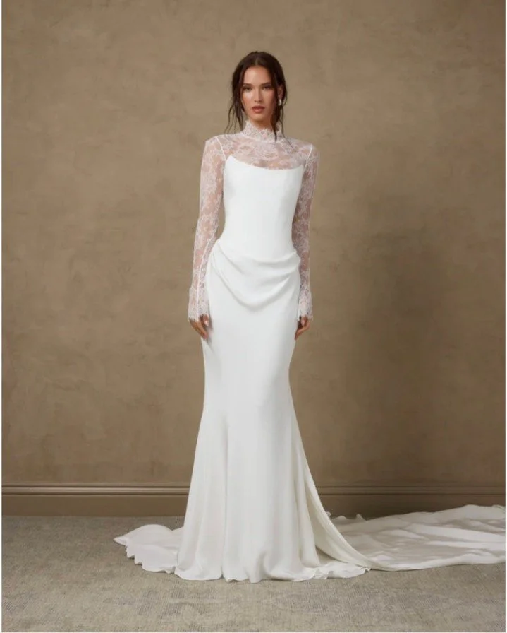 Silk crepe gown with a basque-waist corset, back lacing closure and a slim A-line skirt for Katherine Tash Fall 2026 collection. 
#NYLBFW #WeddingInspiration #BridalFashion #WeddingDress #WeddingInspo #BridalInspo #WeddingStyle #RomanticWedding #Wedd