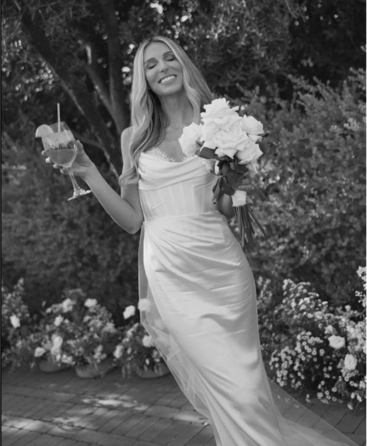 The draped Indu Gown by Katherine Tash on our real bride for her desert set wedding. 
#NYLBFW #WeddingInspiration #BridalFashion #WeddingDress #WeddingInspo #BridalInspo #WeddingStyle #RomanticWedding #WeddingPhotography #BridalStyle #KatherineTash