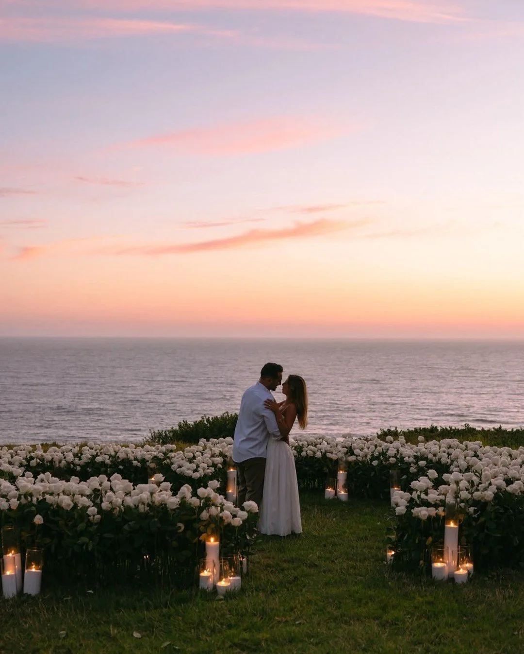 Proposal 2- sunset embrace surrounding blooms and candlelight 

#NYLBFW #WeddingInspiration  #BridalInspo #WeddingStyle #RomanticWedding #WeddingPhotography#proposalinspo