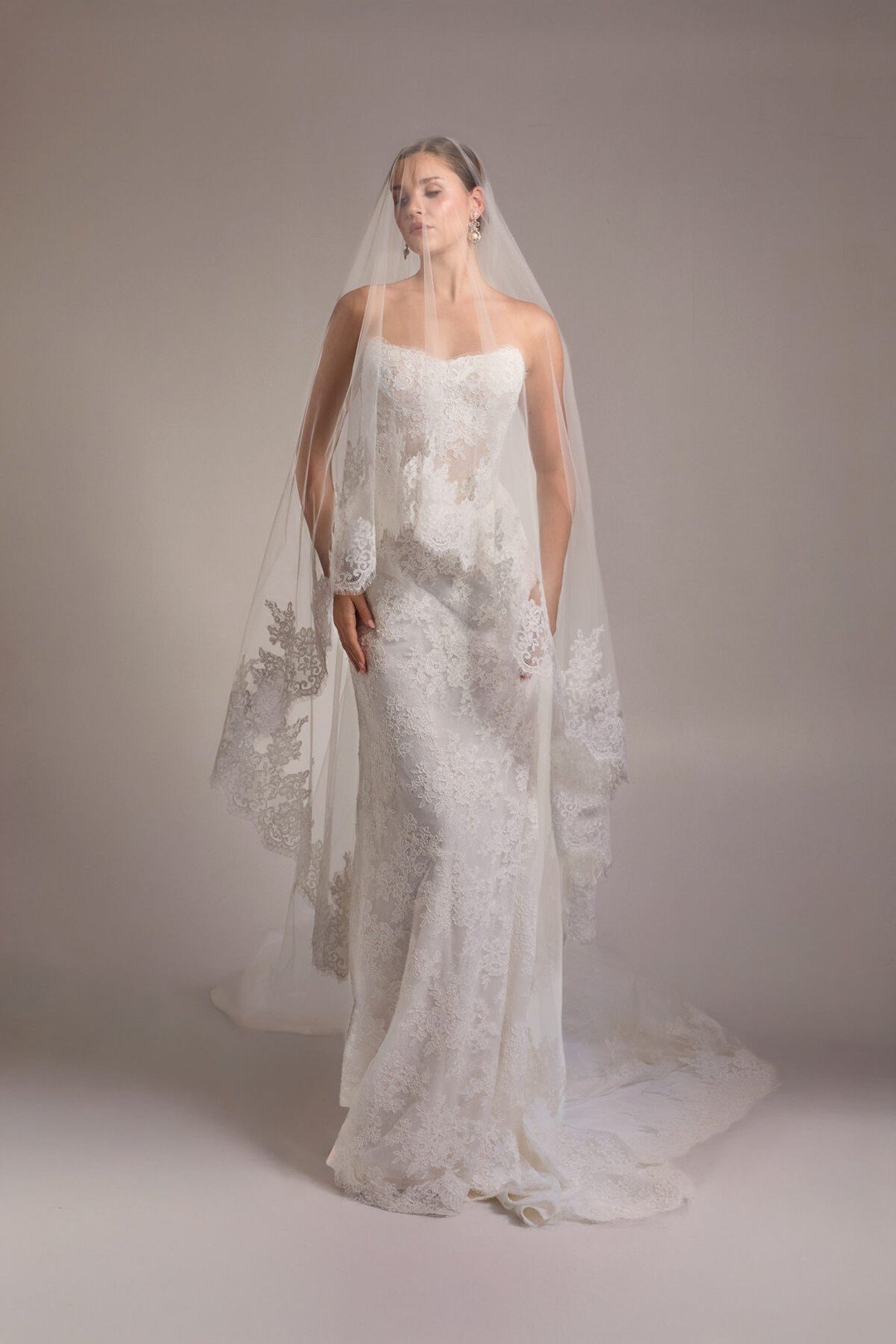 @verdinbridal Blanche Fall 2026 - Belle 

Strapless lace with a sculpted silhouette and a veil edged in delicate detail 

#NYLBFW #WeddingInspiration #BridalFashion #WeddingDress #BridalInspo #WeddingStyle #RomanticWedding #WeddingPhotography #Bridal