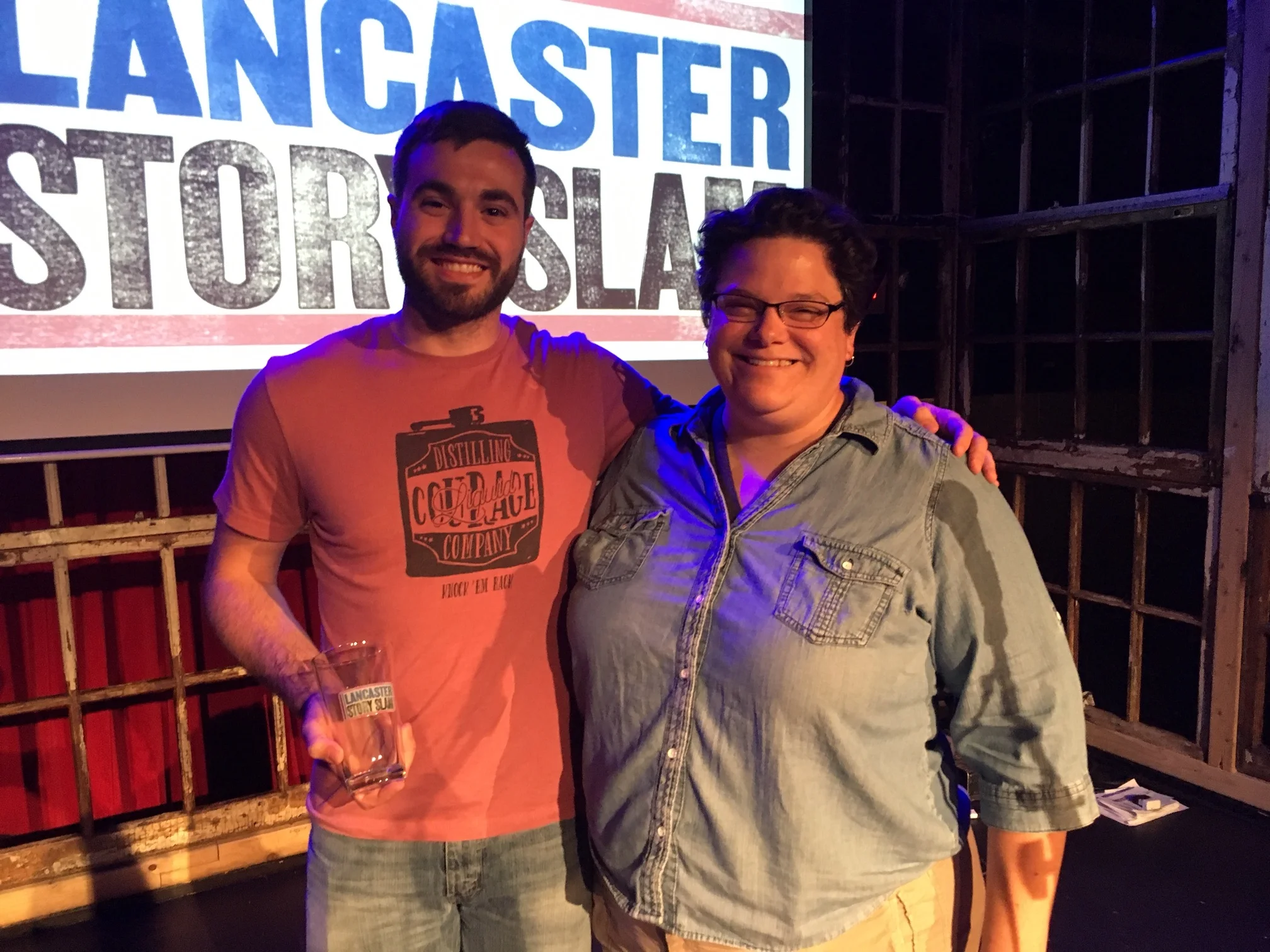 Winner Brian Layng poses with emcee Eileen Joyce