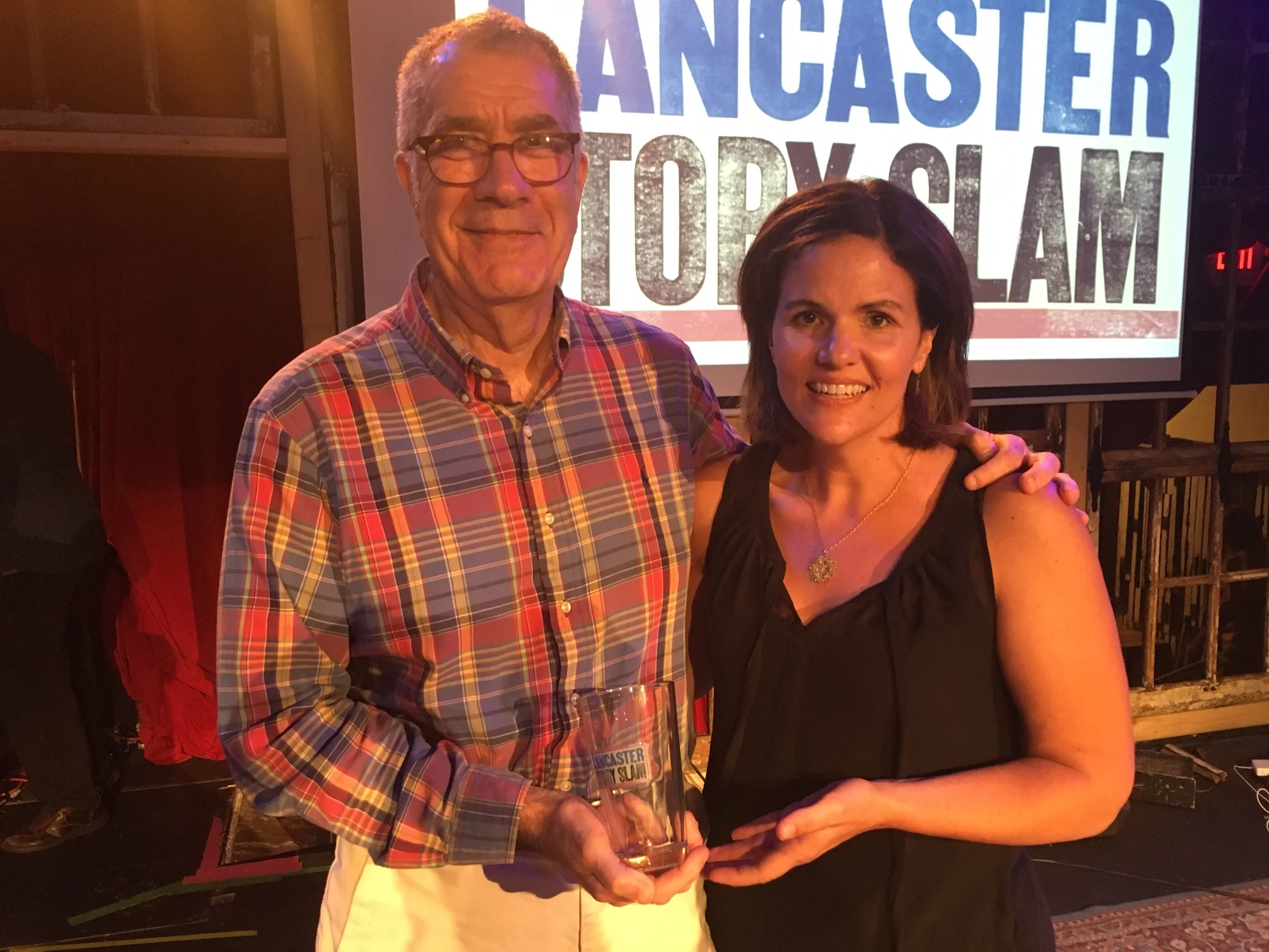 Winning Storyteller Tony Crocamo with emcee Luanne Sims.