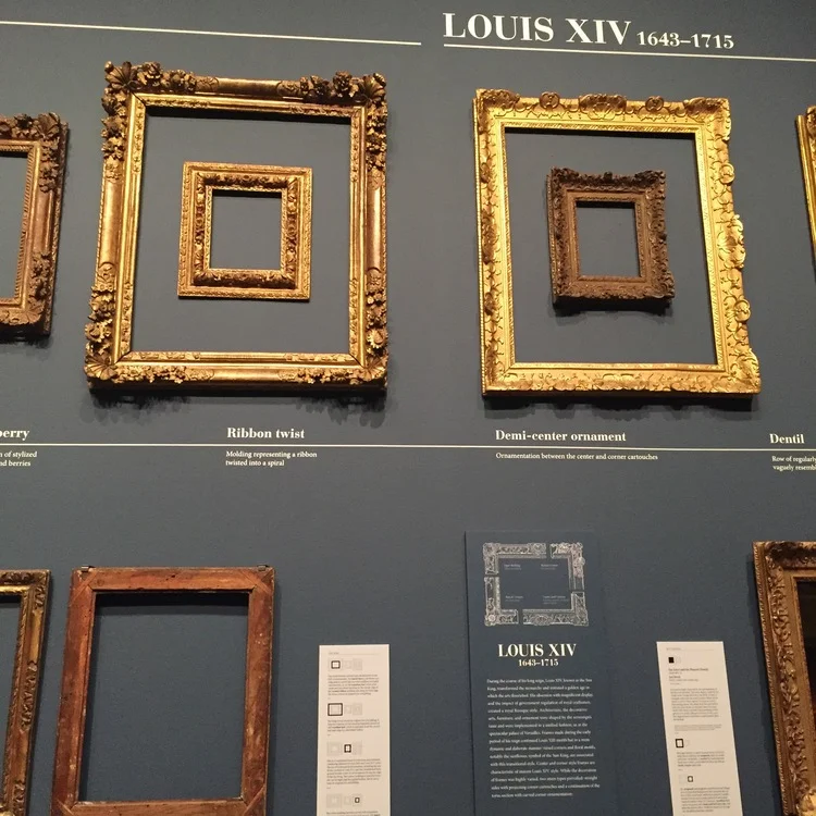 Note the sunflower motif on the corners of the frame at upper left.