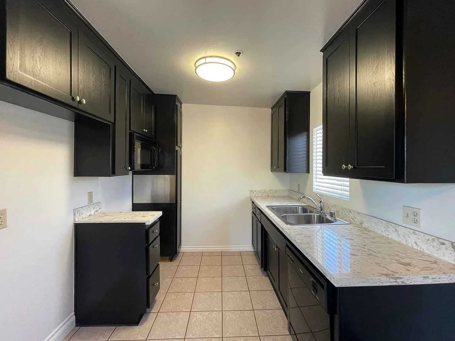 Renovated kitchen with roomy, custom cabinets 