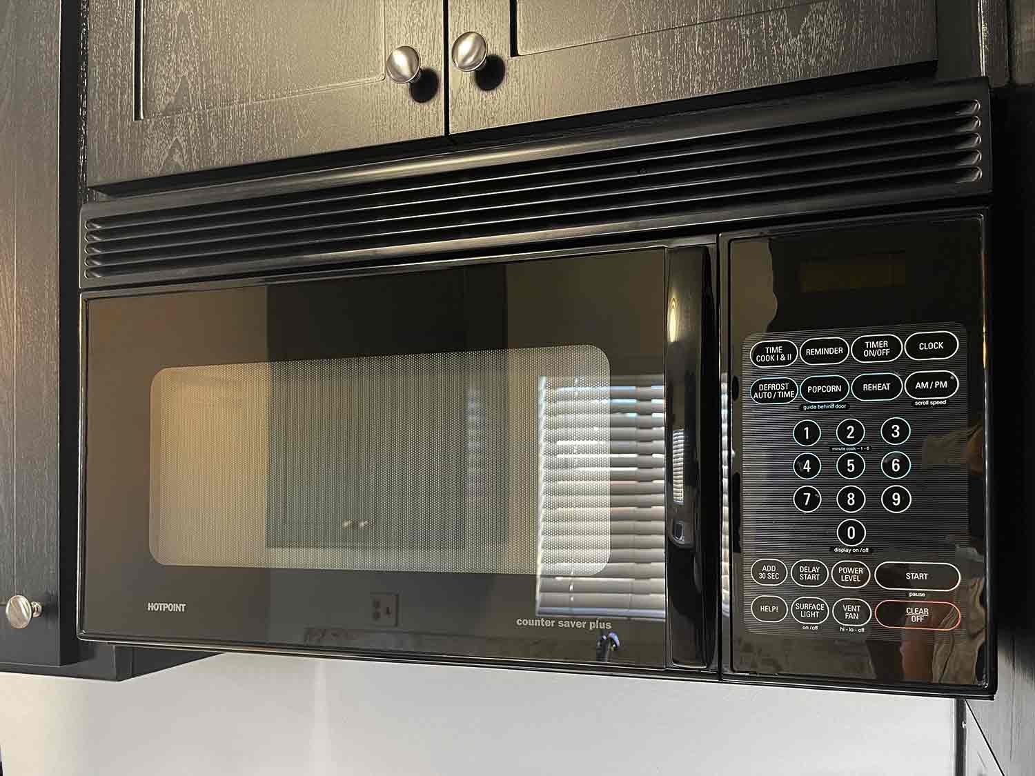  Overhead microwave saves countertop space 