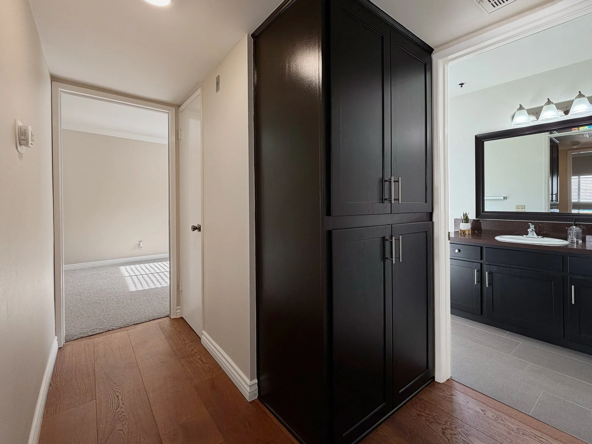  Hall features a linen closet - AND - a floor-to-ceiling bonus closet!  