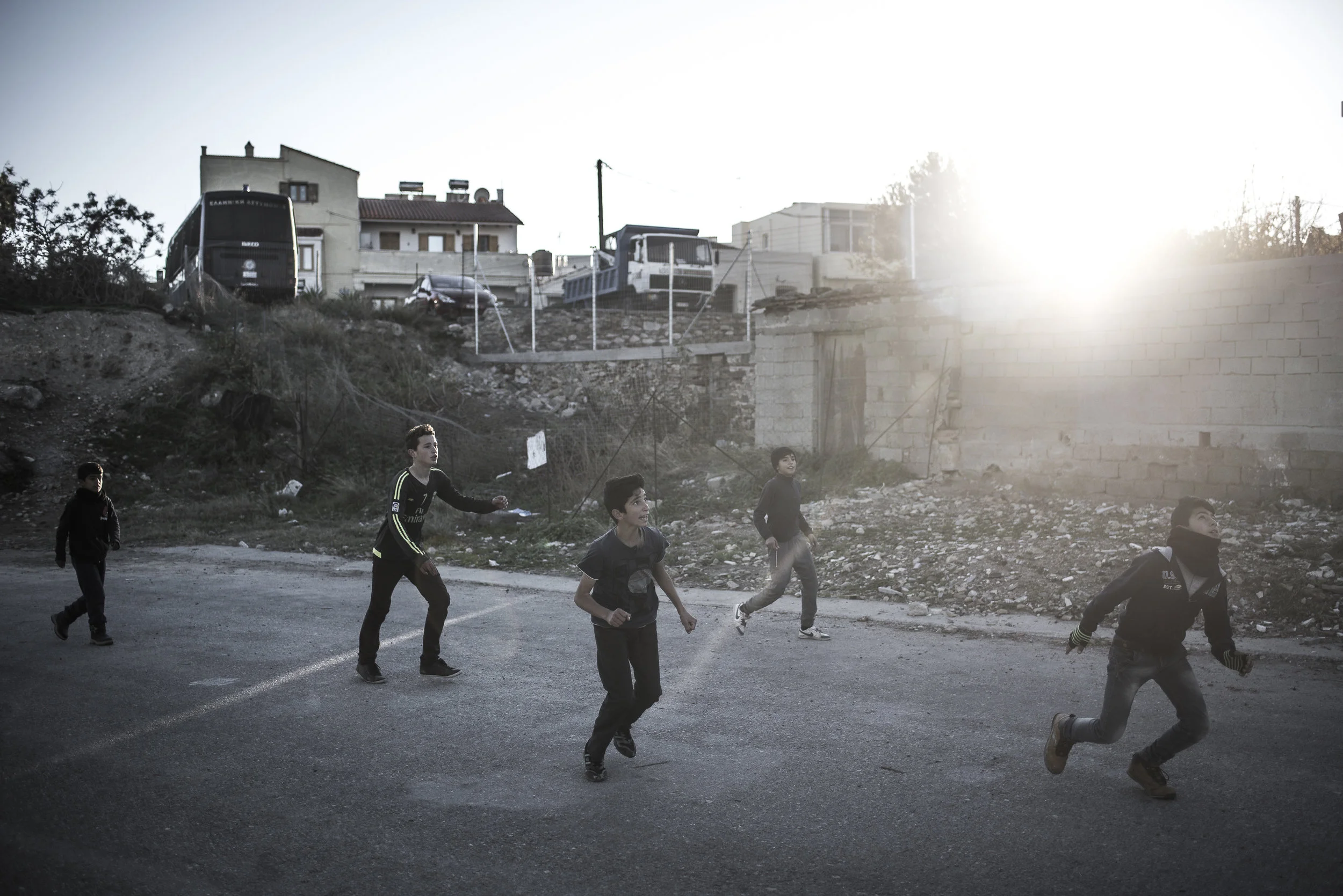Football is a favorite way for children to pass time in Souda camp, next to the games being organized by the volunteers.