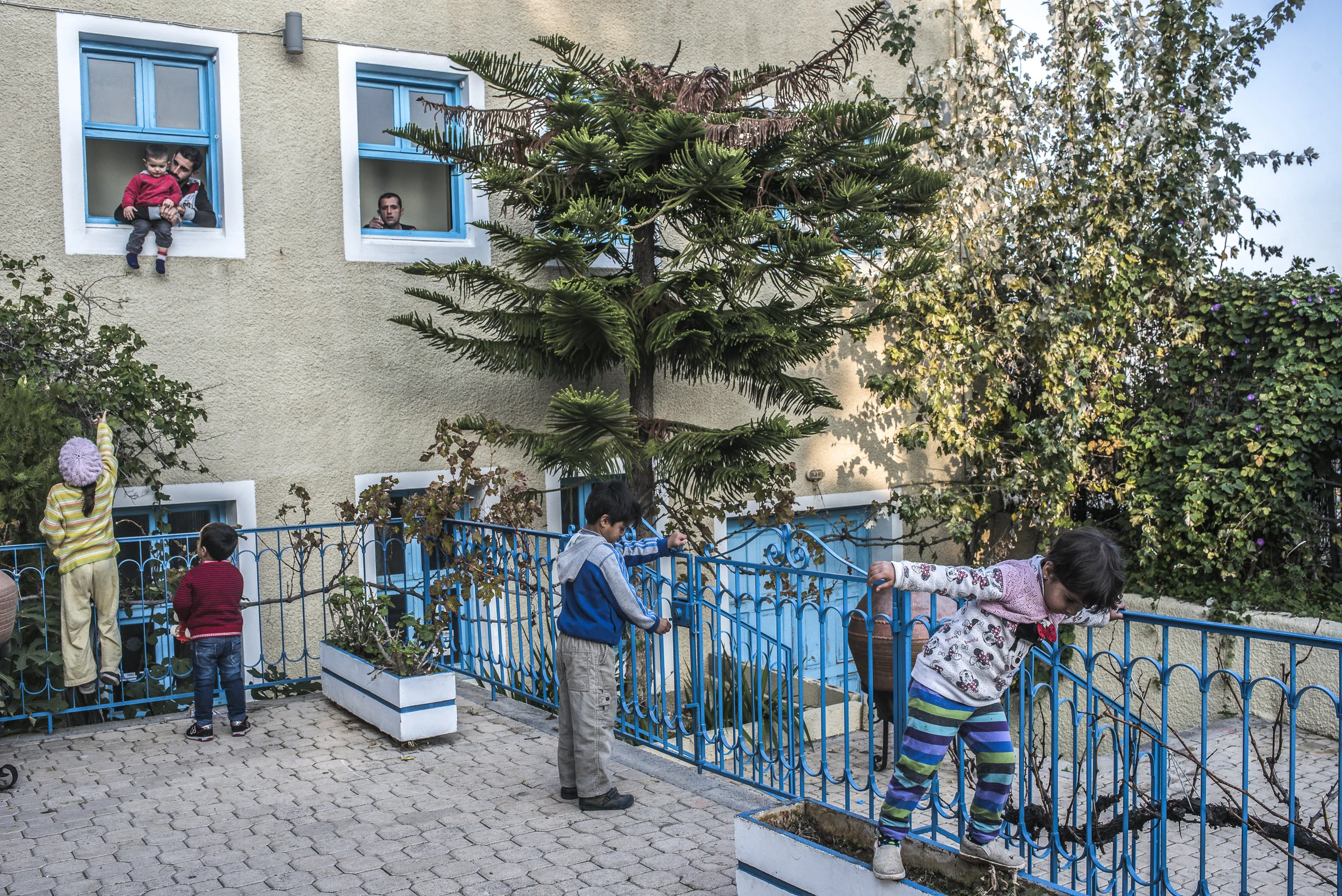 Refugee children playing in hotel in Chios.jpg