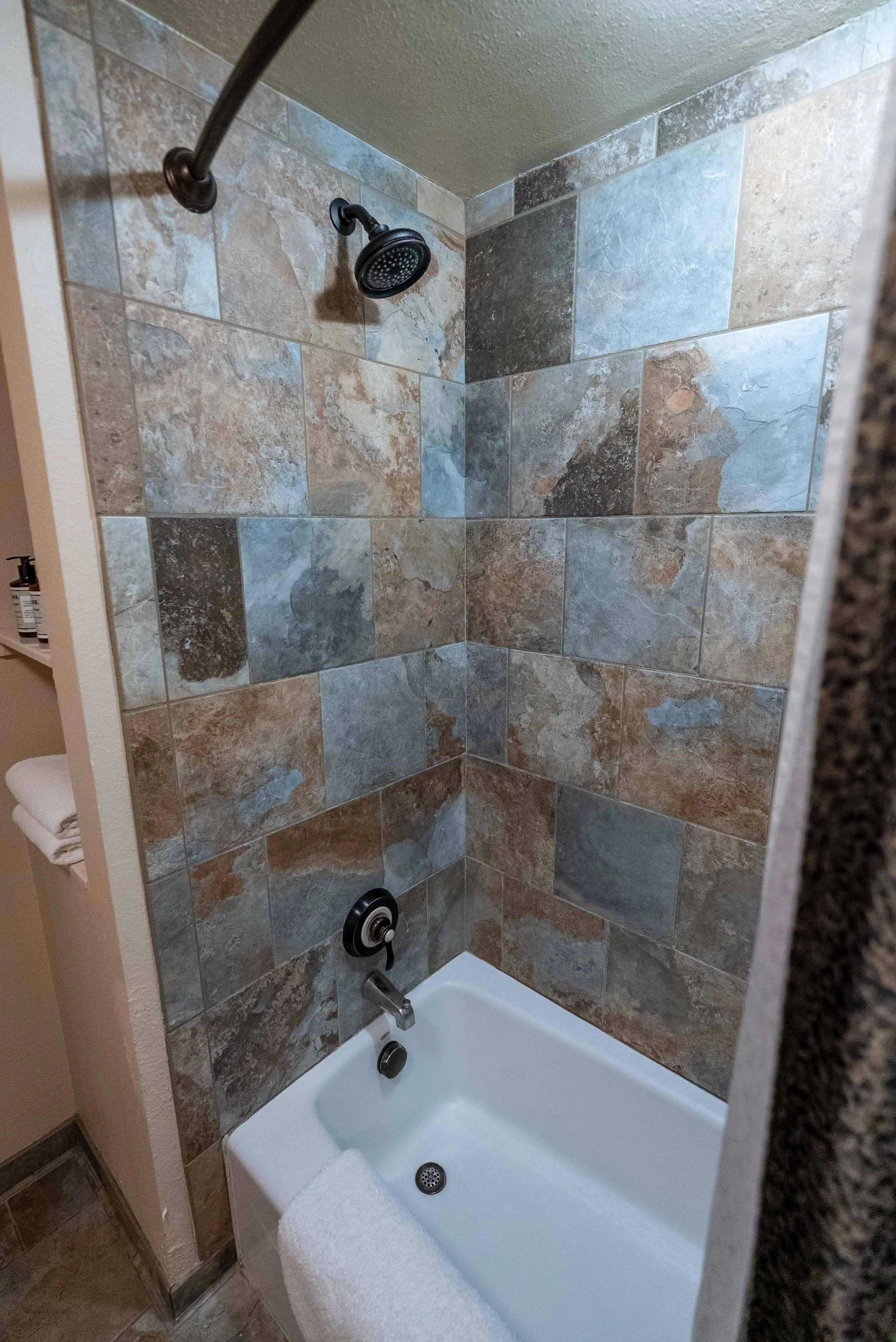 Shower and tub at Rockwell Inn