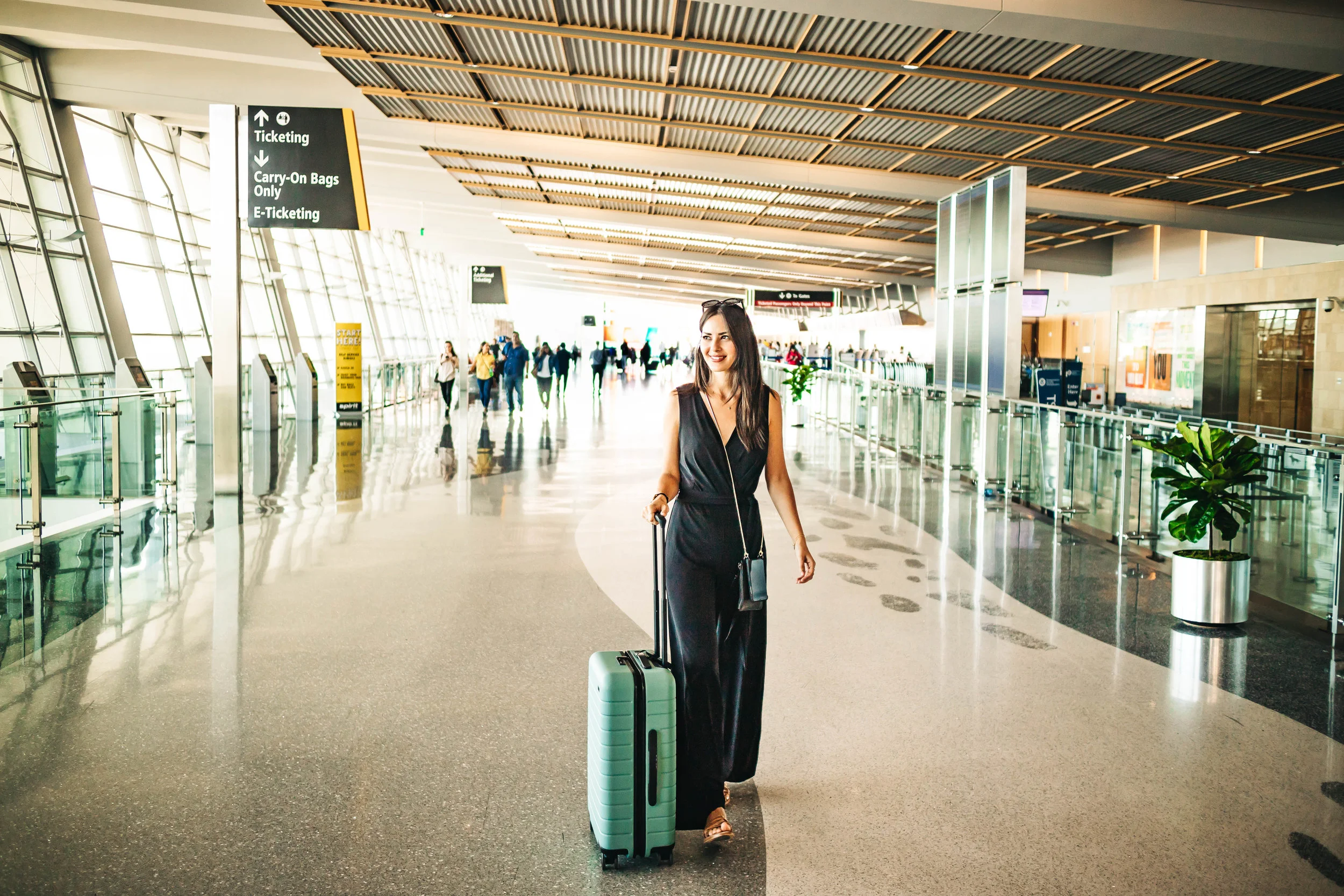 The Must-Have "Away" Suitcase for the Techie Traveler