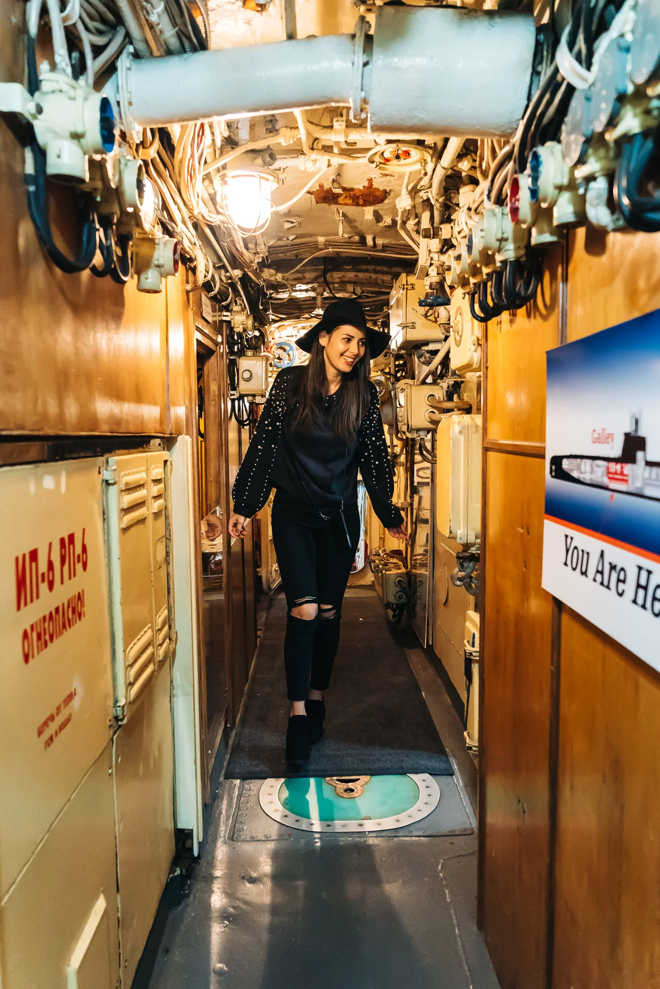 Walking through the narrow hallway of the B-39 Submarine