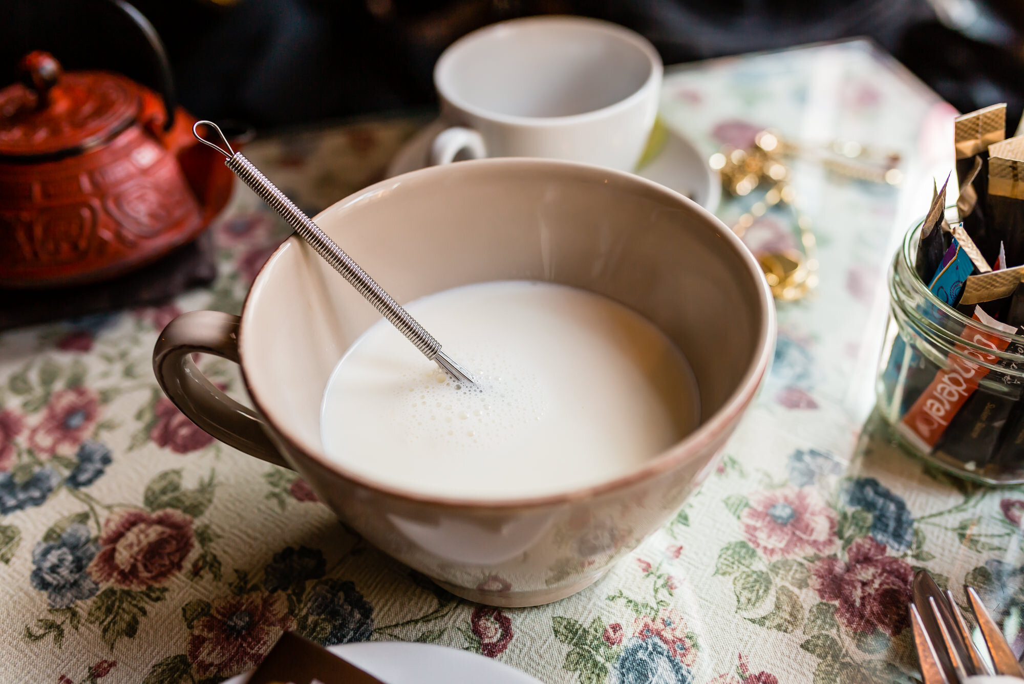 Hot milk to mix your chocolate in