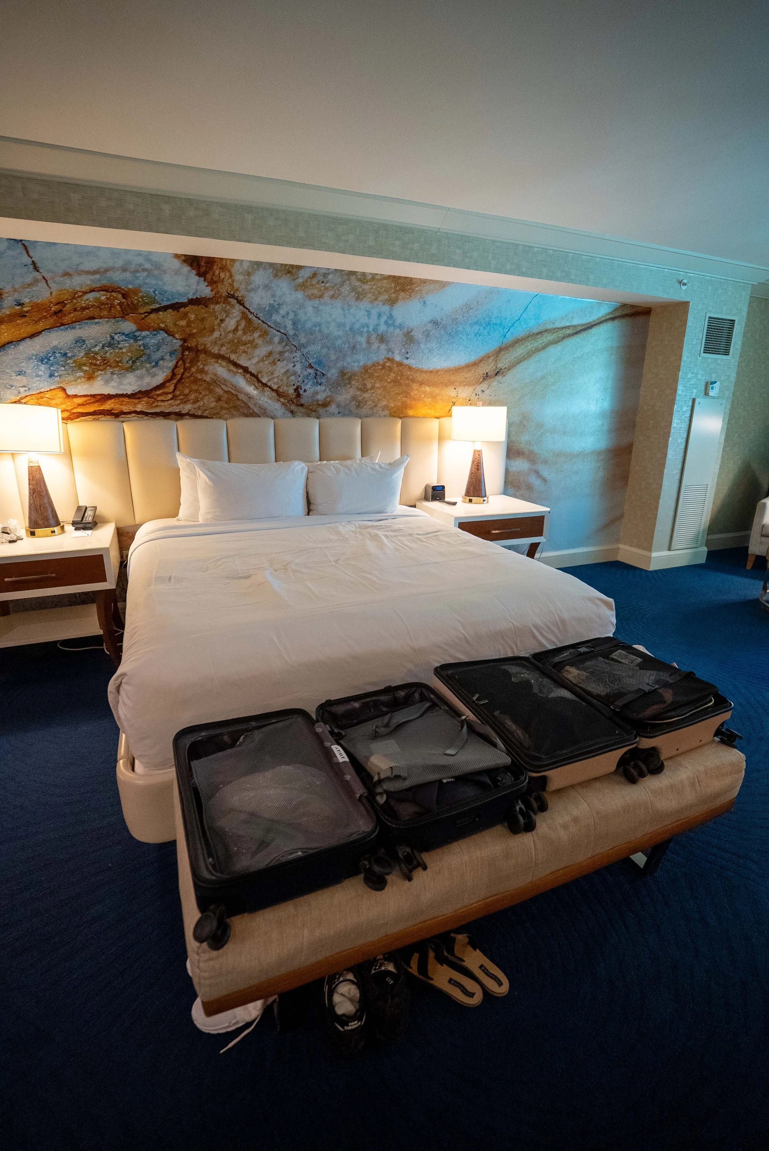Convenient bench to lay out our luggage at foot of the bed