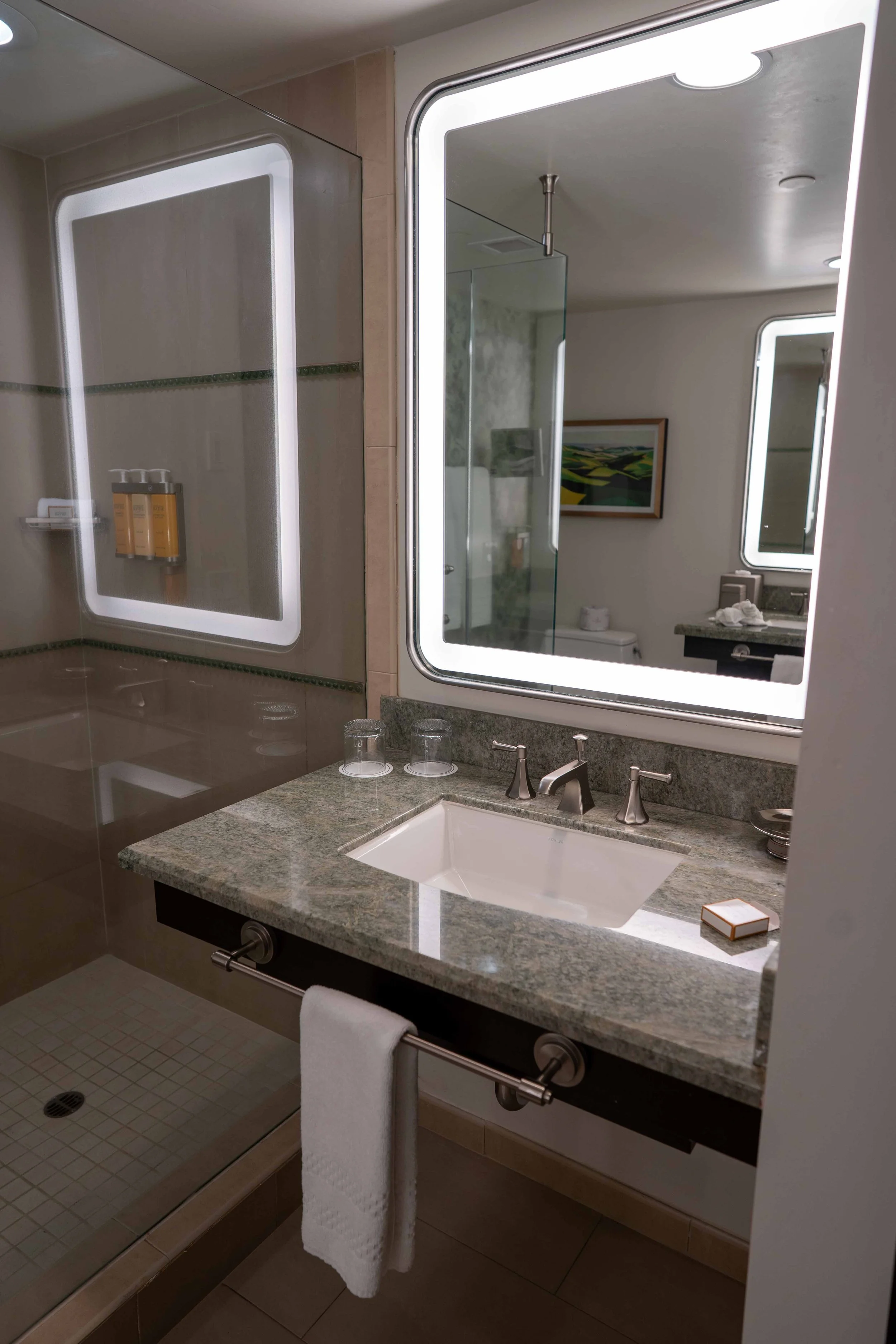 Corque hotel mirror and sink