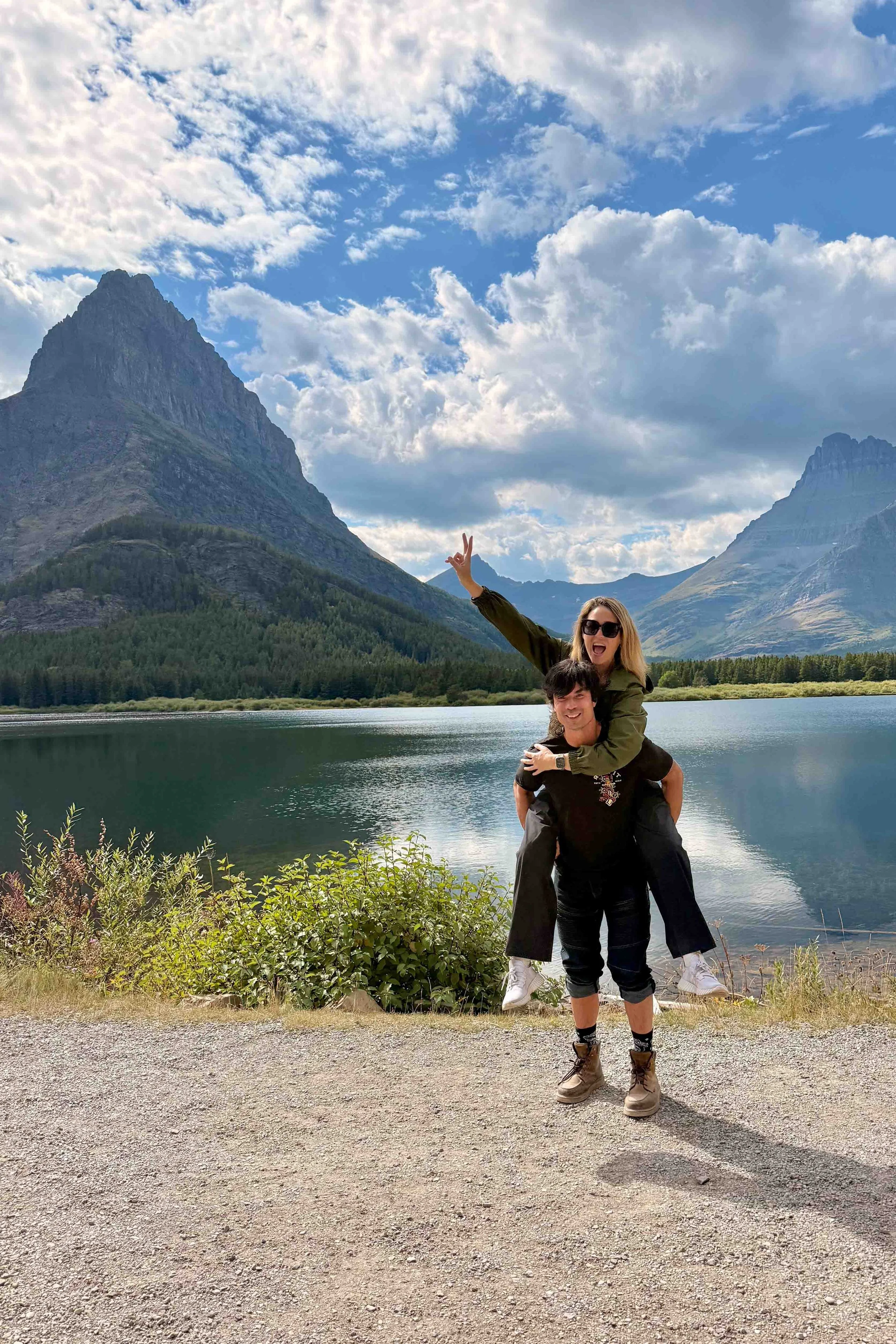 Posing in front of Swiftcurrent Lake at Many Glacier